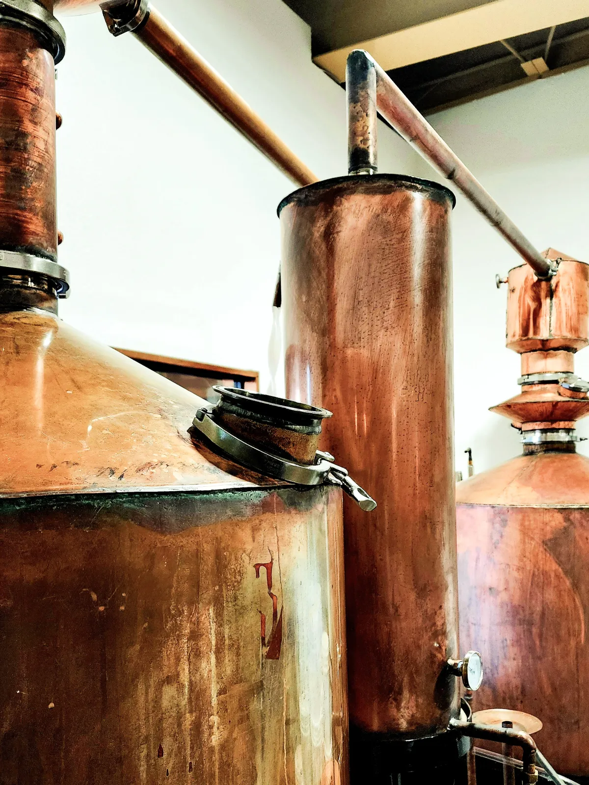 Copper pot still and column inside Big Dog Distillery in Bismarck