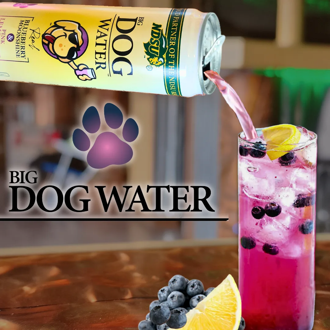 Big Dog Water poured over ice with blueberries and lemon