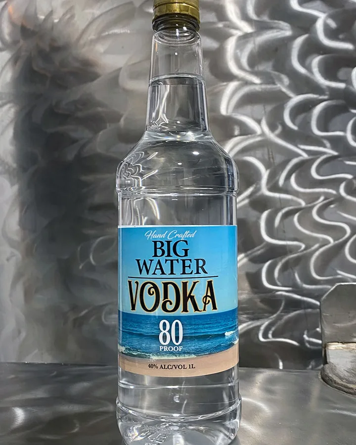 Bottle of Big Water Vodka on brushed steel
